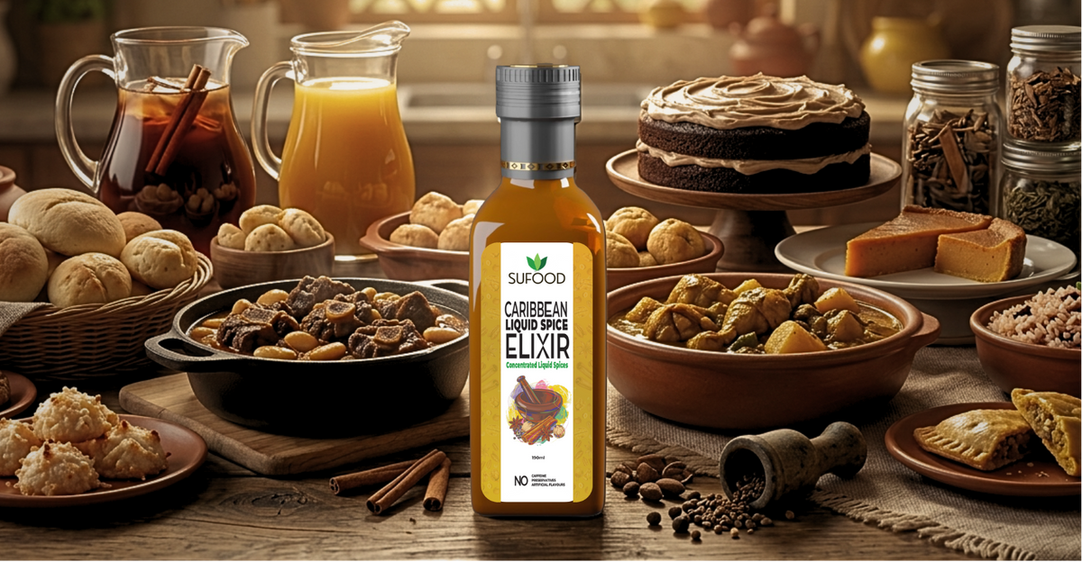 A bottle of Sufood Caribbean Liquid Spice Elixir centered on a rustic wooden table surrounded by various tropical foods, drinks, and spices in a warm, sunlit kitchen setting.